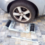 kiskocsi emelő kocsi autómentő